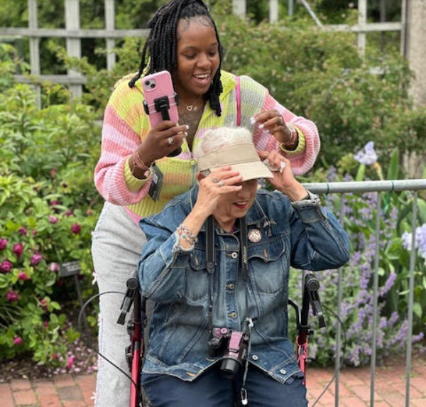 N'ia with elder in garden